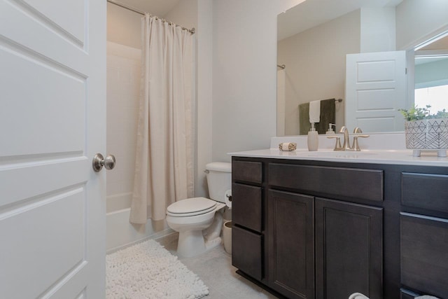 bathroom with tile patterned flooring, shower / bath combo with shower curtain, toilet, and vanity