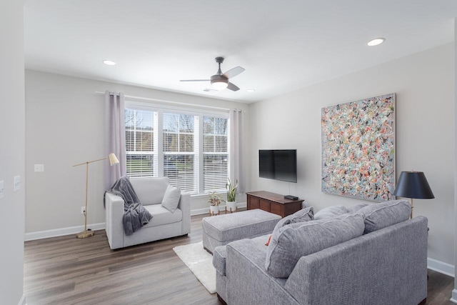 living room with wood finished floors, baseboards, recessed lighting, and ceiling fan