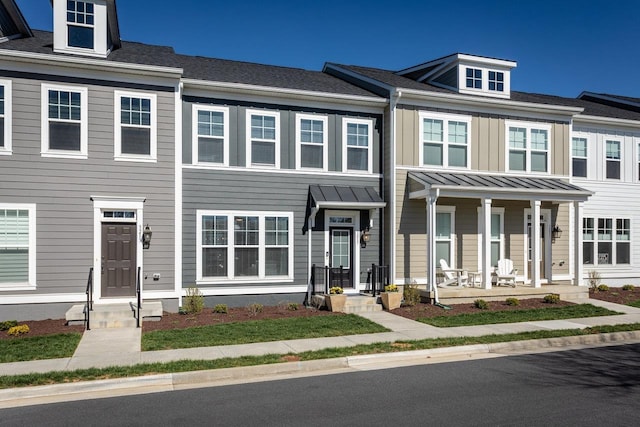 multi unit property featuring a porch