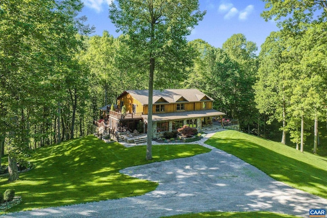 view of front of home featuring a porch and a front lawn