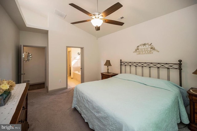 bedroom with carpet flooring, visible vents, and lofted ceiling