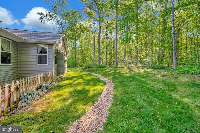 view of yard featuring fence