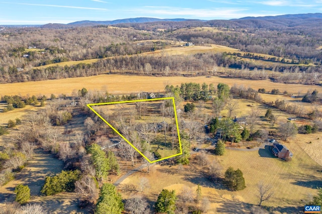 birds eye view of property with a rural view and a mountain view