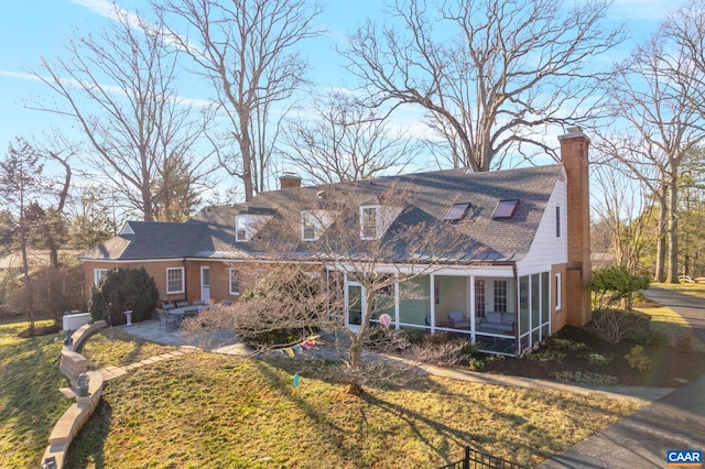 cape cod home featuring a porch, roof with shingles, and a chimney