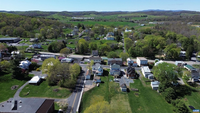 bird's eye view with a residential view and a view of trees