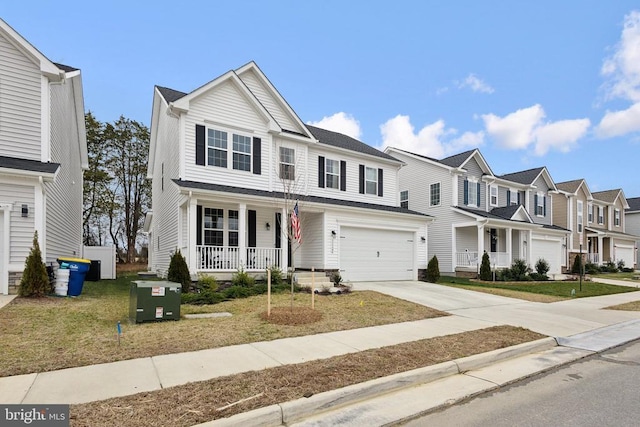 view of front of home with covered porch, a garage, driveway, a residential view, and a front lawn