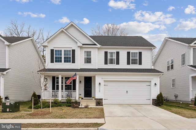 traditional-style home featuring driveway, covered porch, a shingled roof, and a garage