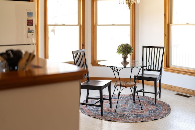 interior space with a chandelier