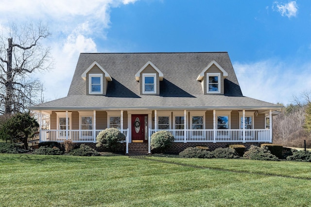 view of front facade featuring a front yard and a porch