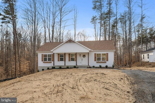 single story home with covered porch