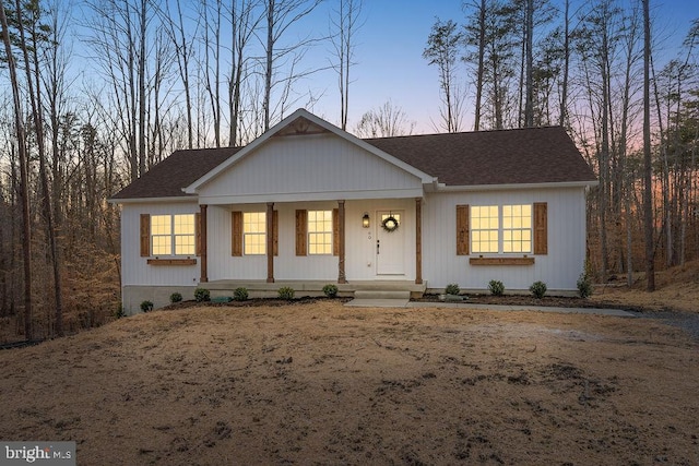 ranch-style house with covered porch