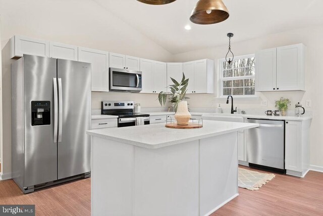 kitchen featuring white cabinetry, sink, and stainless steel appliances