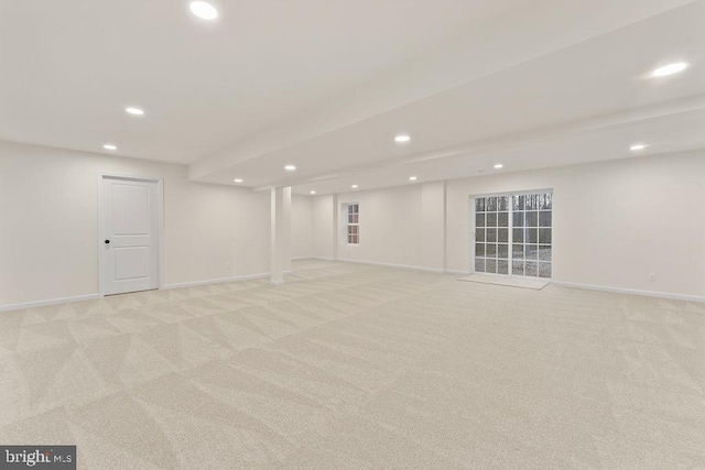 basement with light colored carpet