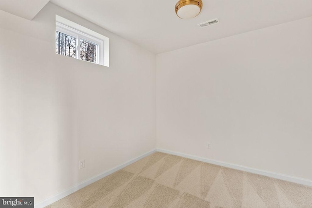 spare room with carpet floors