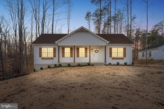 single story home with covered porch