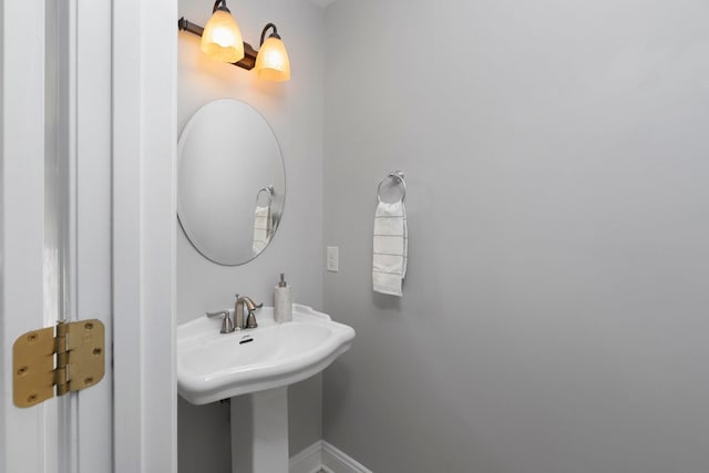 bathroom featuring baseboards