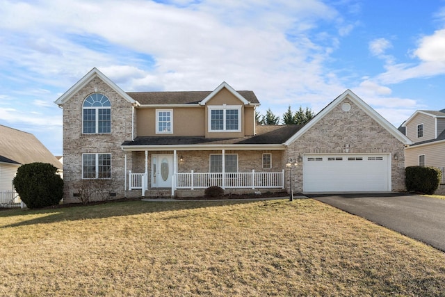 traditional home featuring an attached garage, covered porch, driveway, crawl space, and a front lawn