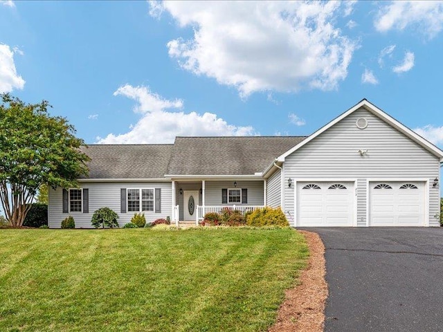 ranch-style house with a garage, a front yard, and a porch