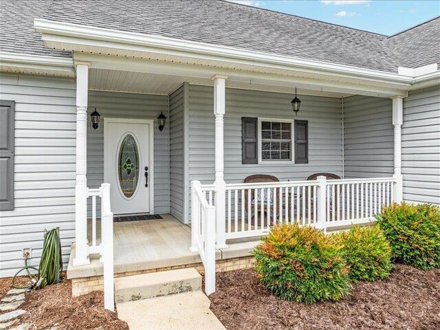 property entrance with a porch