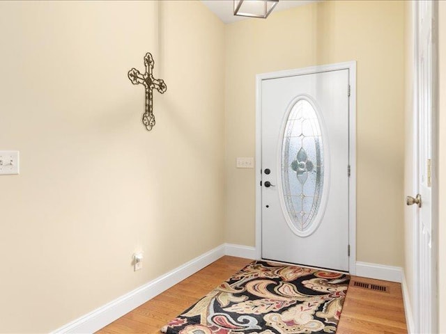 entrance foyer with hardwood / wood-style flooring