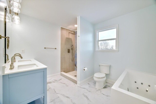 full bathroom with plus walk in shower, vanity, and toilet