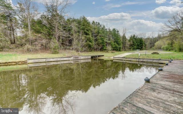 view of dock featuring a water view