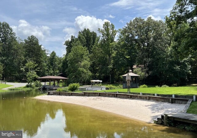 property view of water featuring a gazebo