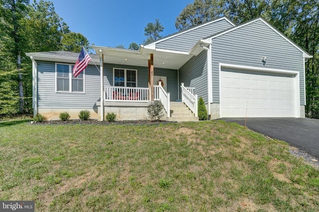 single story home featuring aphalt driveway, an attached garage, covered porch, and a front lawn