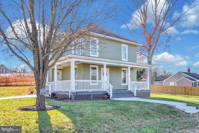 view of front facade featuring a porch and a front lawn