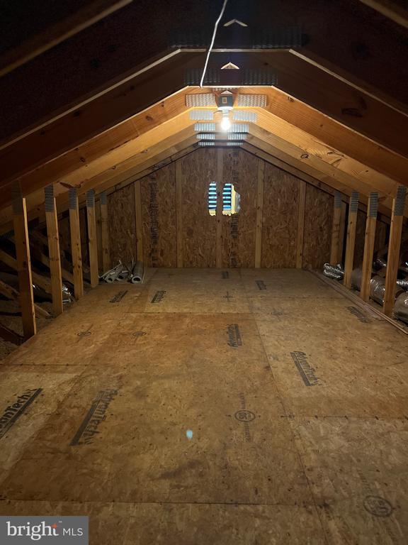 view of unfinished attic