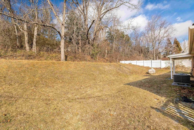 view of yard featuring central AC unit