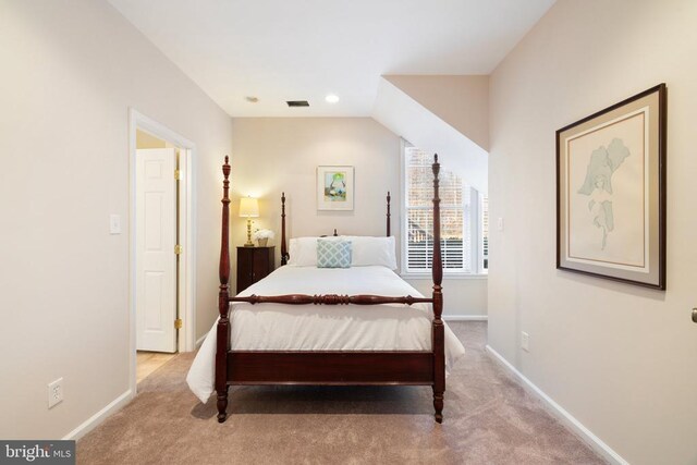 bedroom with light carpet