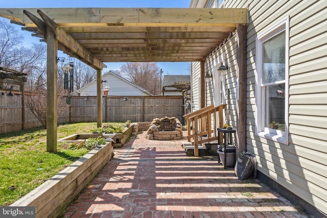 view of patio featuring fence