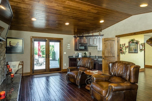 living room with vaulted ceiling, dark hardwood / wood-style floors, wooden ceiling, and french doors