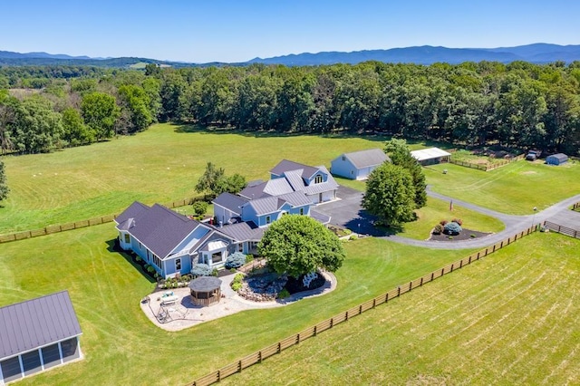 birds eye view of property featuring a rural view and a mountain view