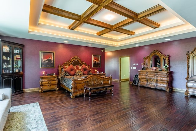 bedroom with coffered ceiling, dark hardwood / wood-style floors, and beamed ceiling