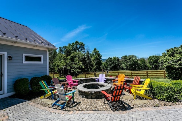 view of patio / terrace featuring a fire pit