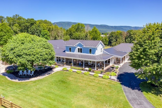 exterior space featuring a mountain view