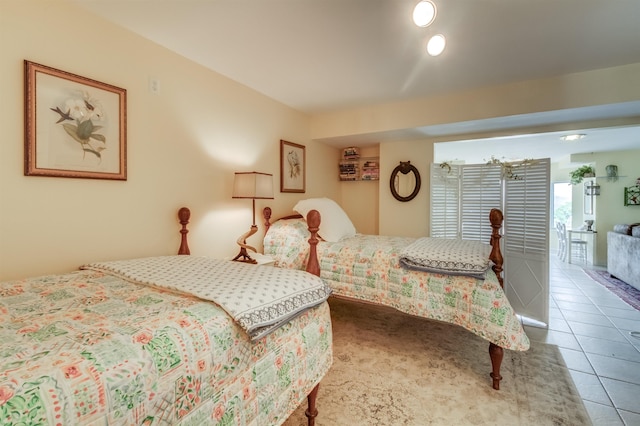 bedroom featuring tile patterned flooring