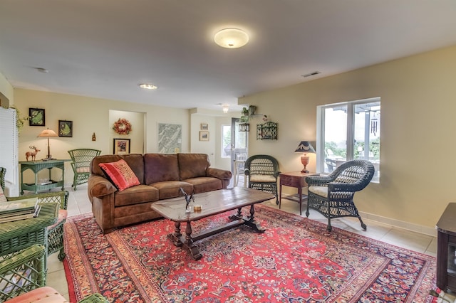 living room featuring light tile patterned flooring