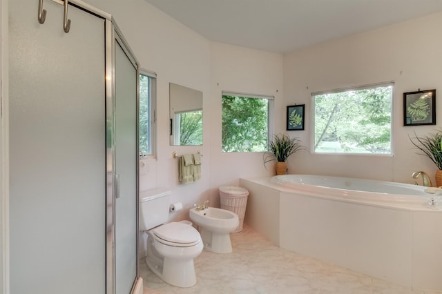 bathroom featuring a bidet, toilet, separate shower and tub, and tile patterned flooring