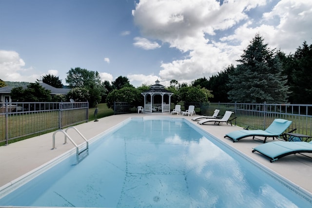 view of pool with a gazebo and a patio