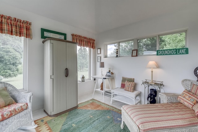 living area with light tile patterned floors