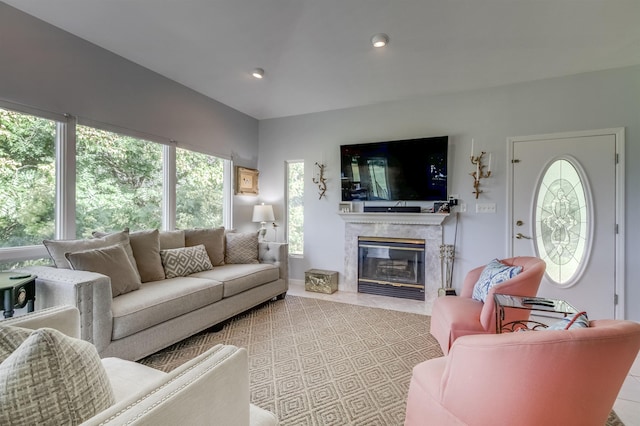 living room featuring a fireplace