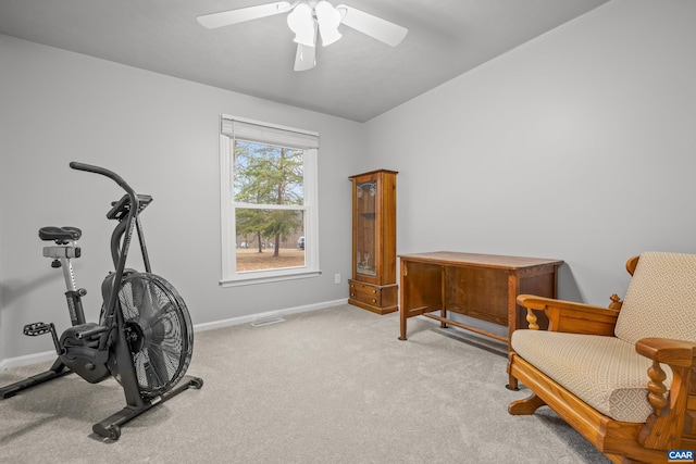 exercise room featuring visible vents, baseboards, a ceiling fan, and carpet floors