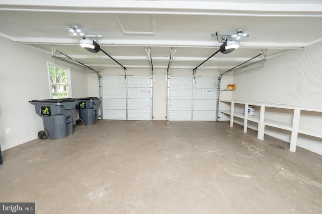 garage featuring a garage door opener