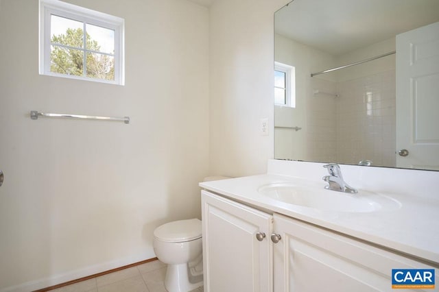 full bathroom featuring vanity, tile patterned floors, toilet, and baseboards