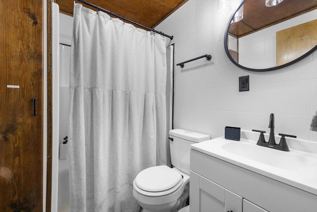 bathroom featuring vanity, toilet, tile walls, and a shower with shower curtain