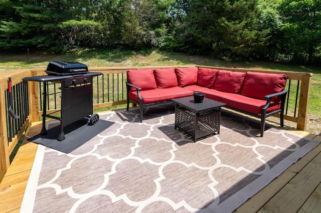 view of patio featuring a wooden deck, grilling area, and an outdoor hangout area