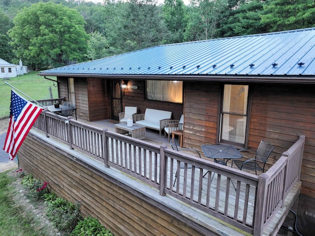 wooden deck with outdoor lounge area